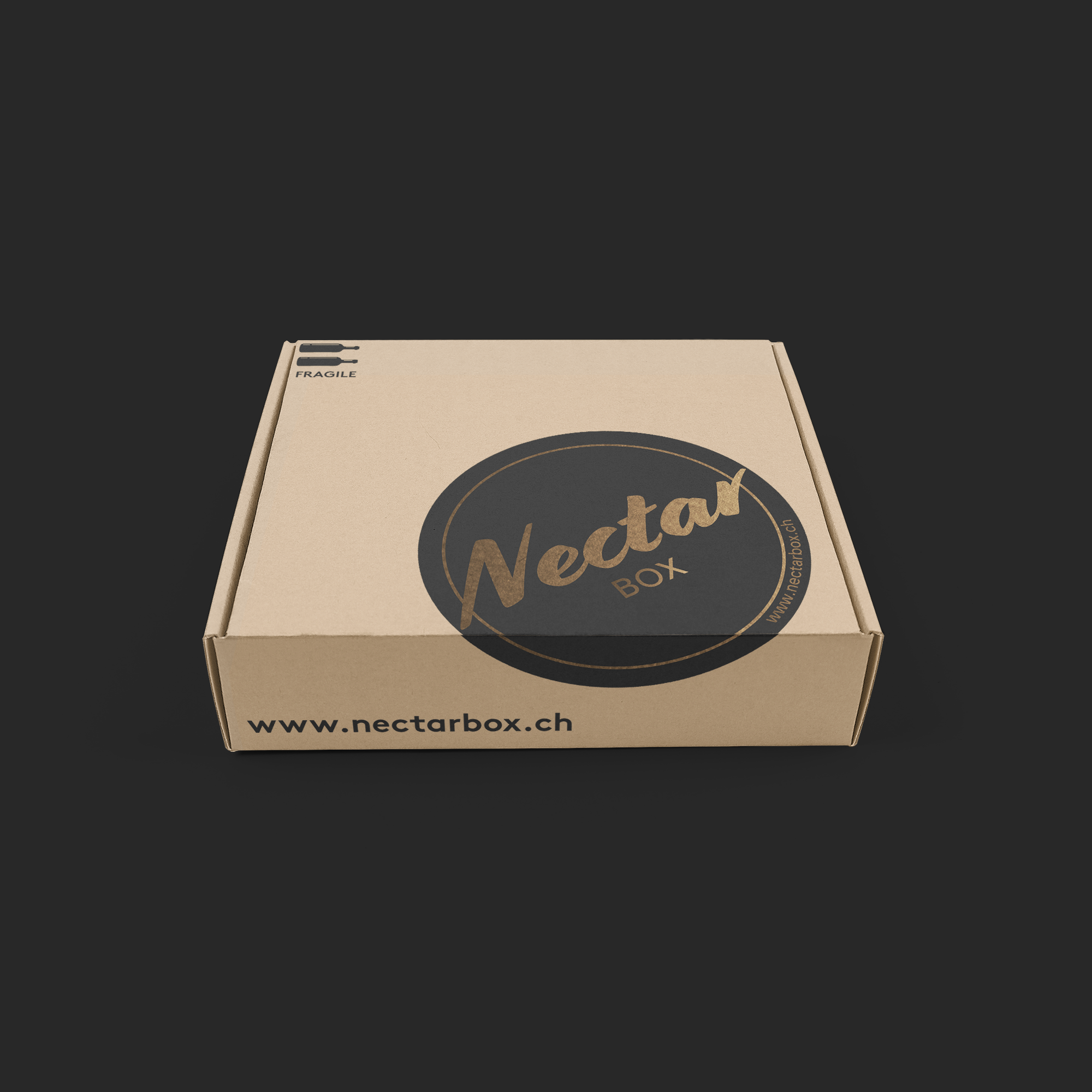 A closed Nectar Box mailing box showing the gold oval mark and the nectarbox.ch address